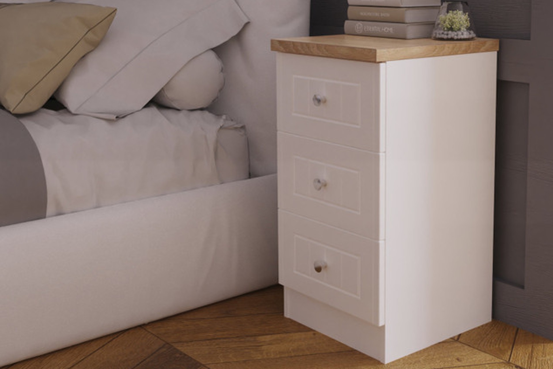 Stylish and contemporary Andria 3 drawer white bedside table with oak top and round, silver handles.