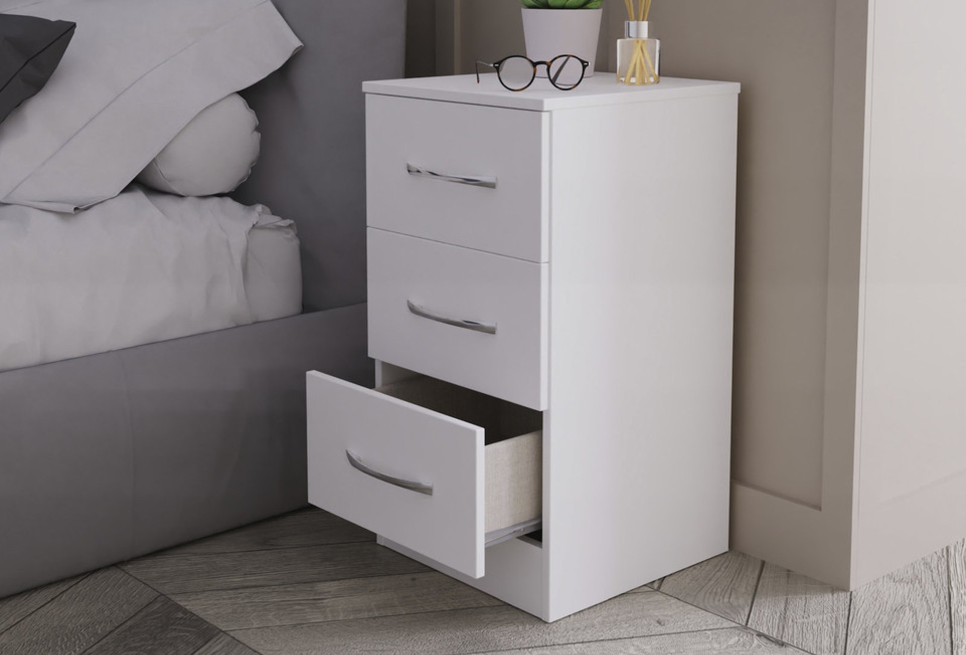 Ferrara white 3-drawer bedside table in situ