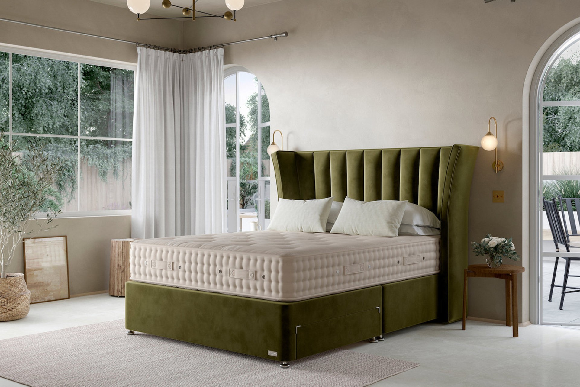 Hypnos Luxurious Earth 05 Divan Bed Set On Castors in Dutch green with wrap around headboard.